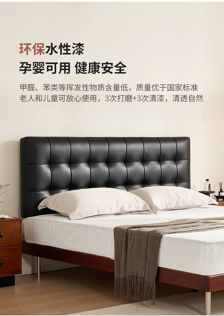 Full view of the Bauhaus Waffle Bed with black leather headboard and walnut frame