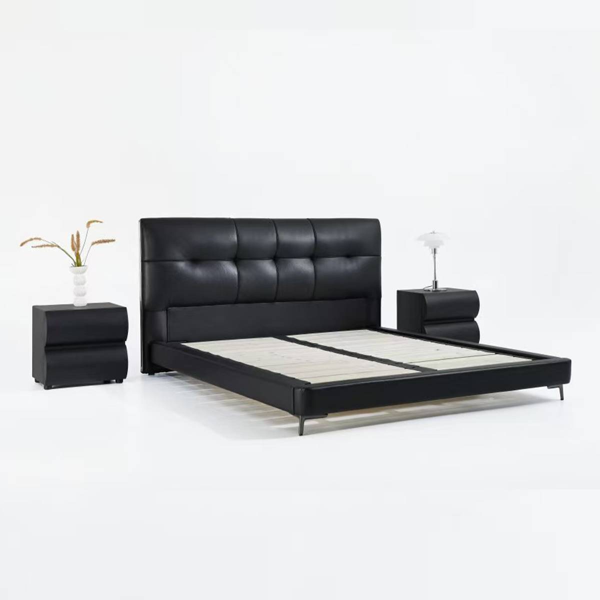 Bed frame without mattress showing wooden slat base