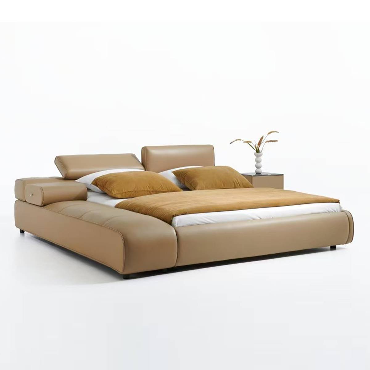 Angled view showing the chaise lounge extension and headboard design