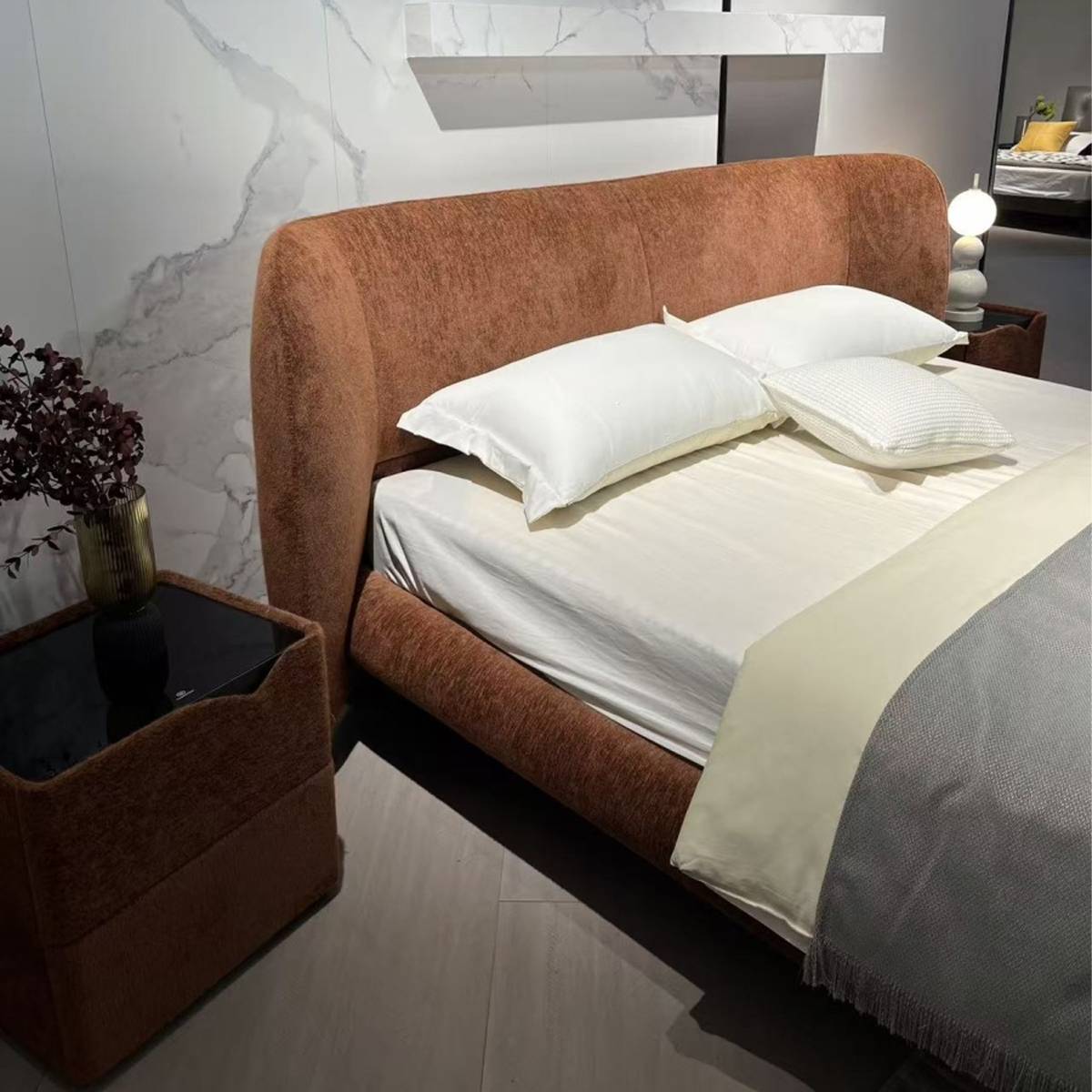 Close-up view of the bed headboard and pillows
