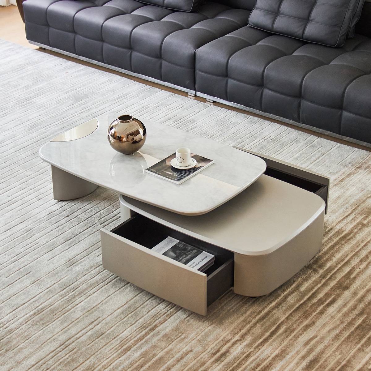 Coffee table with the drawer pulled out, revealing storage space inside.