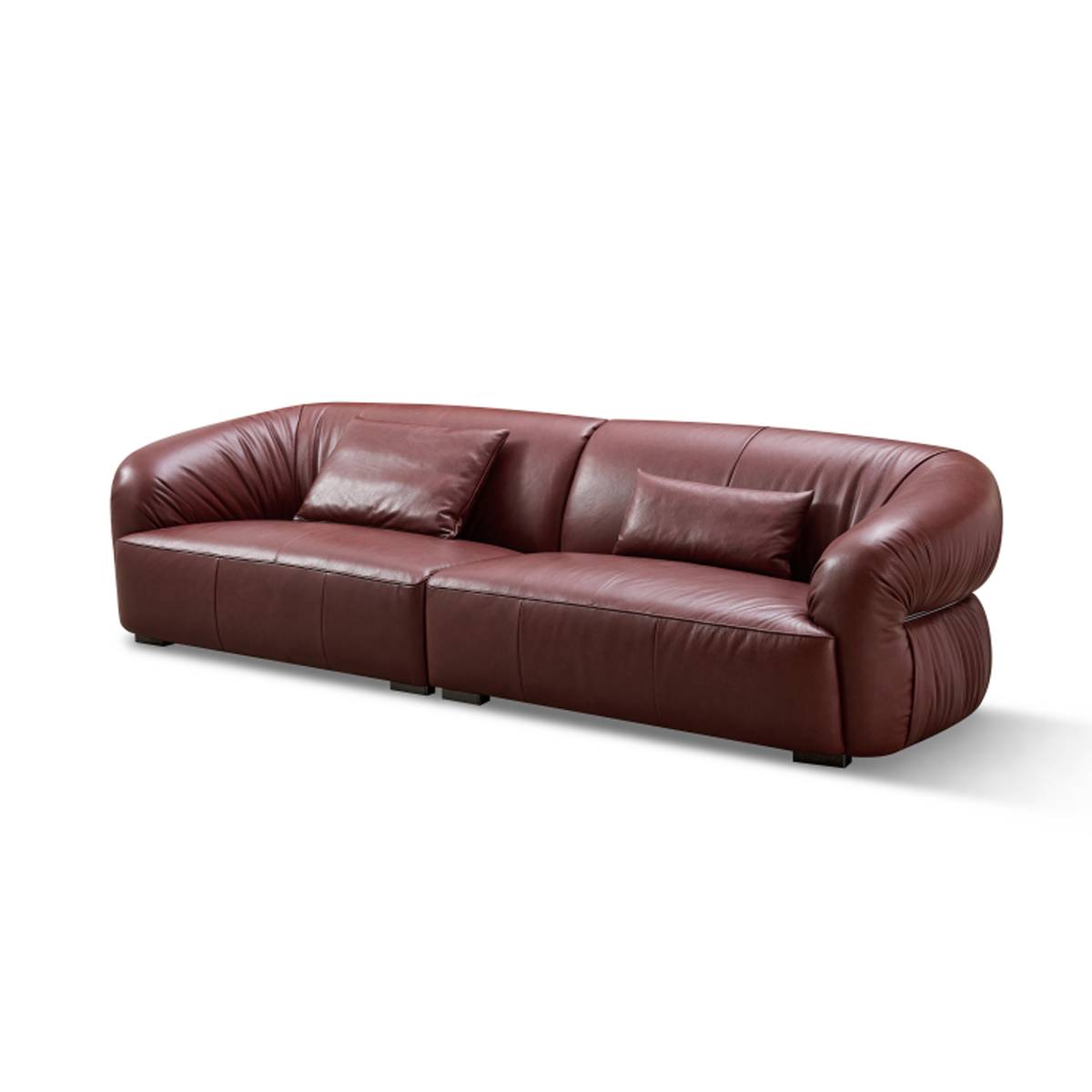 Side view of brown leather sofa showing legs