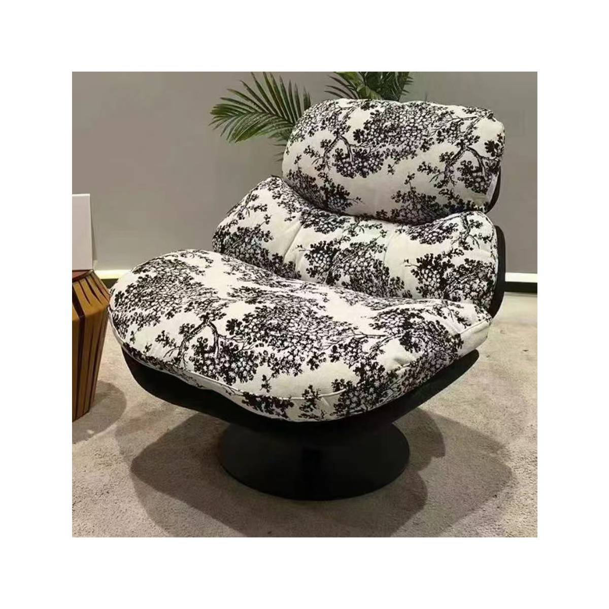 Close-up of lounge chair with floral pattern cushions