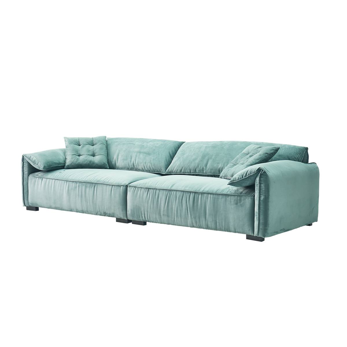 Three-quarter view of the teal B12 Elephant Ear sofa highlighting the depth and armrest design
