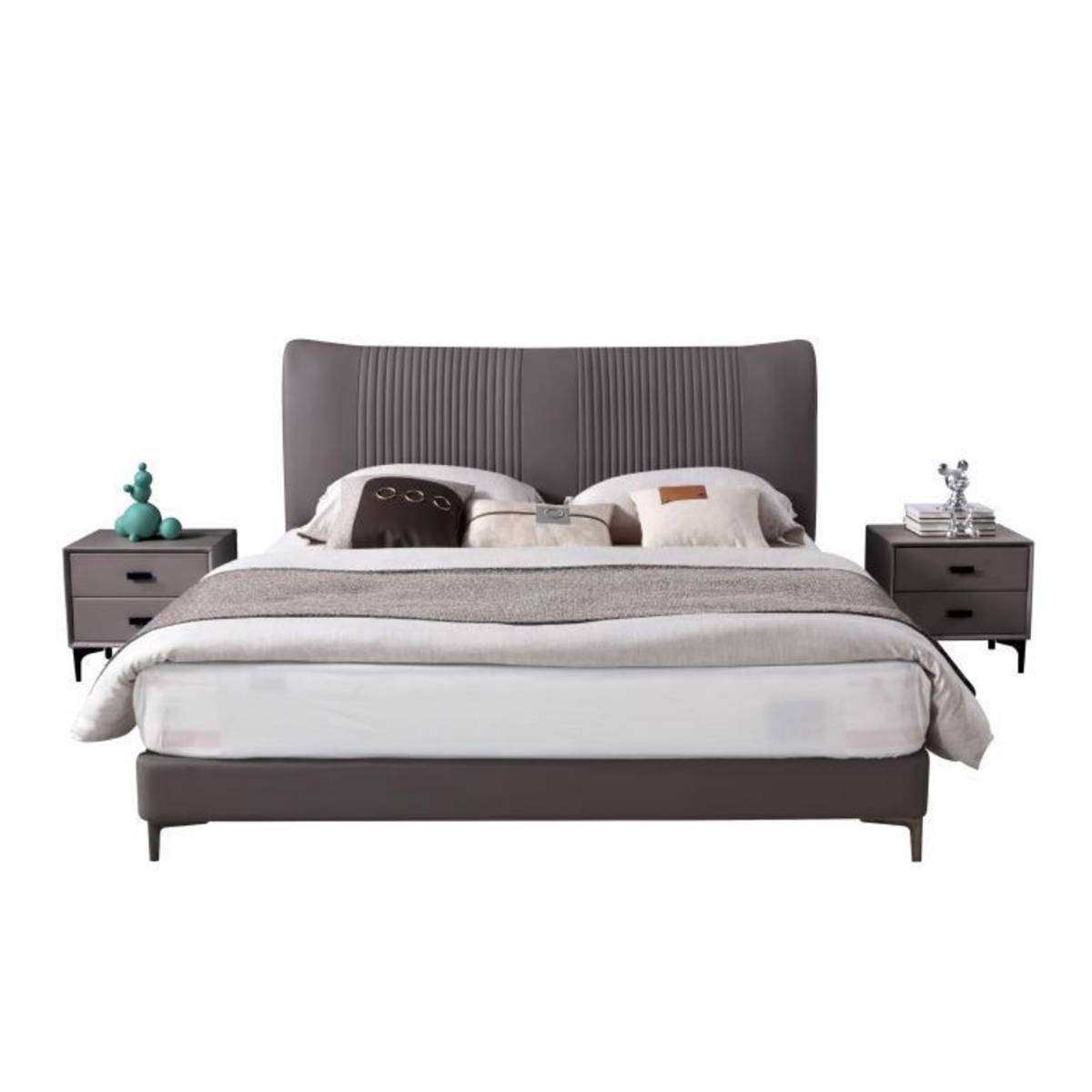 Front view of a grey upholstered bed with a tufted headboard and matching bedside tables