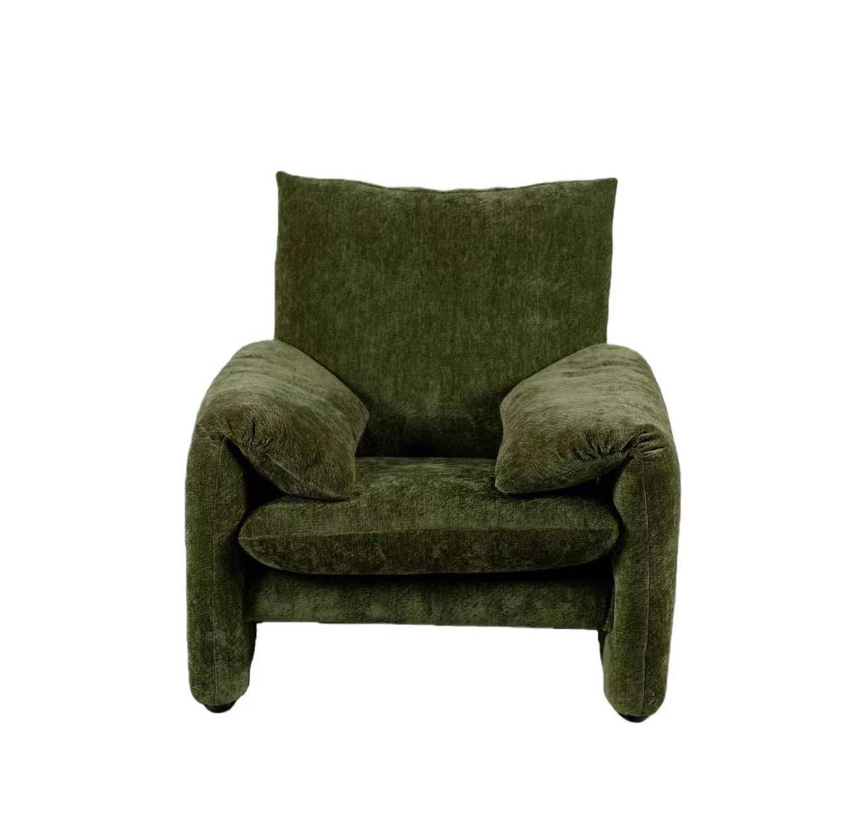 Front view of the green velvet lounge chair with the back cushion upright