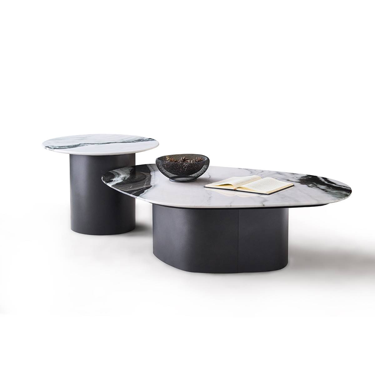 Front view of the marble coffee table with a book and decorative bowl on top