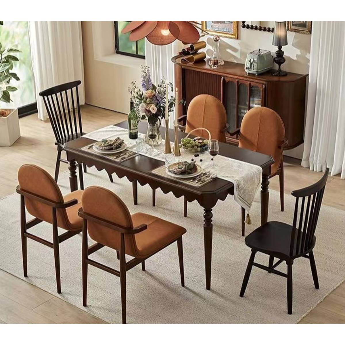 Dining table set with table runner and mixed dining chairs