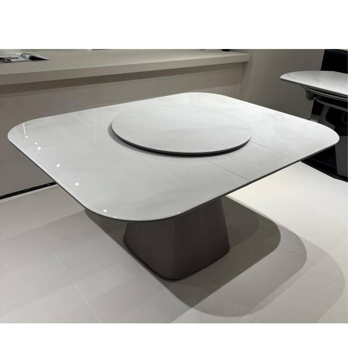 Top-down view of the dining table showing the microcrystalline stone surface and rotating tray