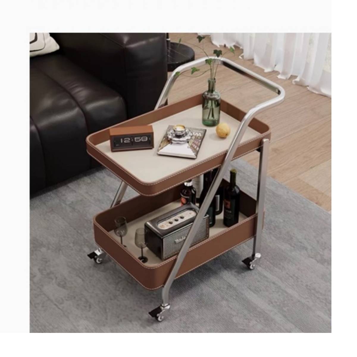 Brown rolling side table with stainless steel frame and saddle leather trays