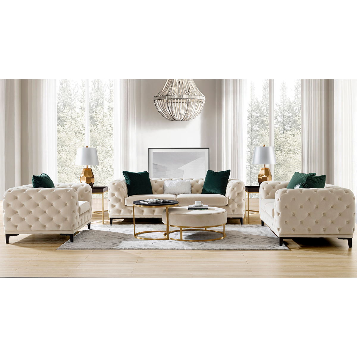 Cream tufted sofa set in a bright living room with gold accents