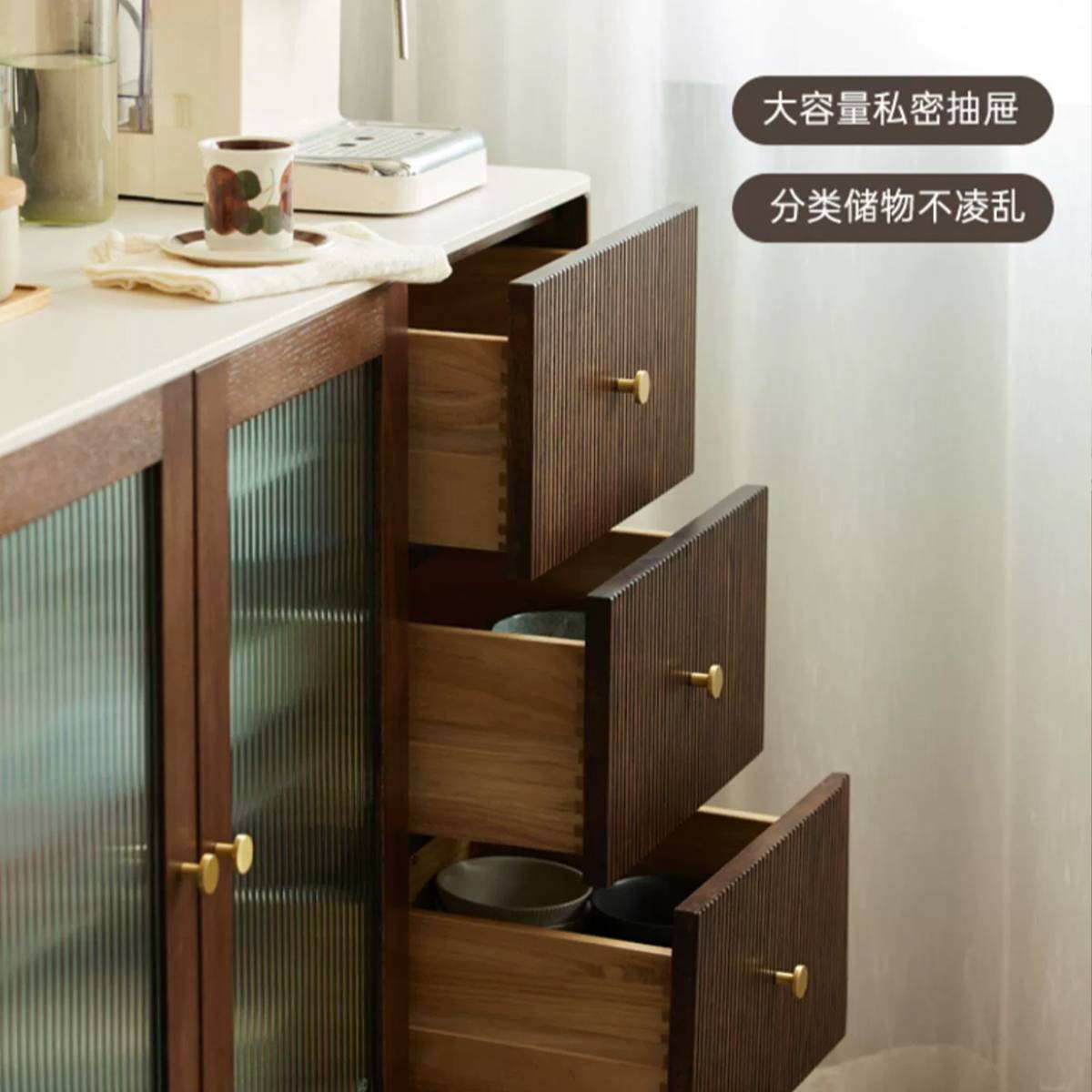 Close-up of the three open drawers showing storage capacity