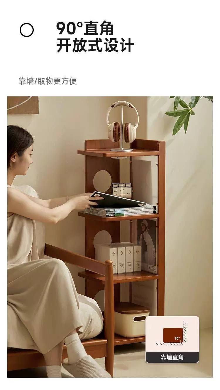 Side cabinet used as a storage unit for books and decor in a home office