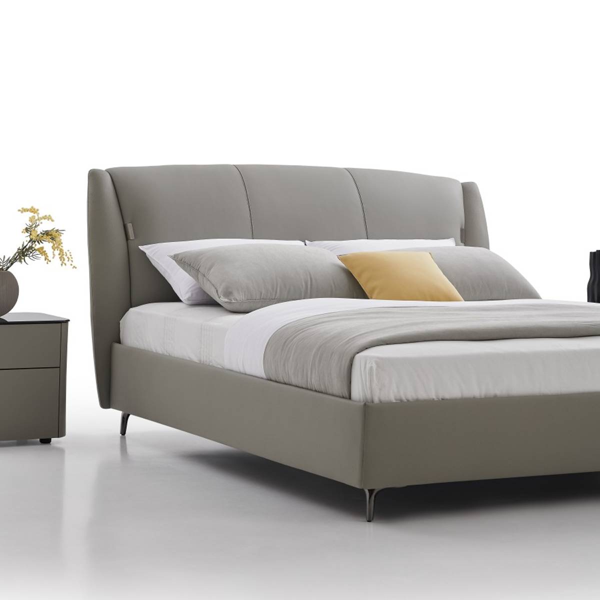 Close-up view of the bed headboard and pillows