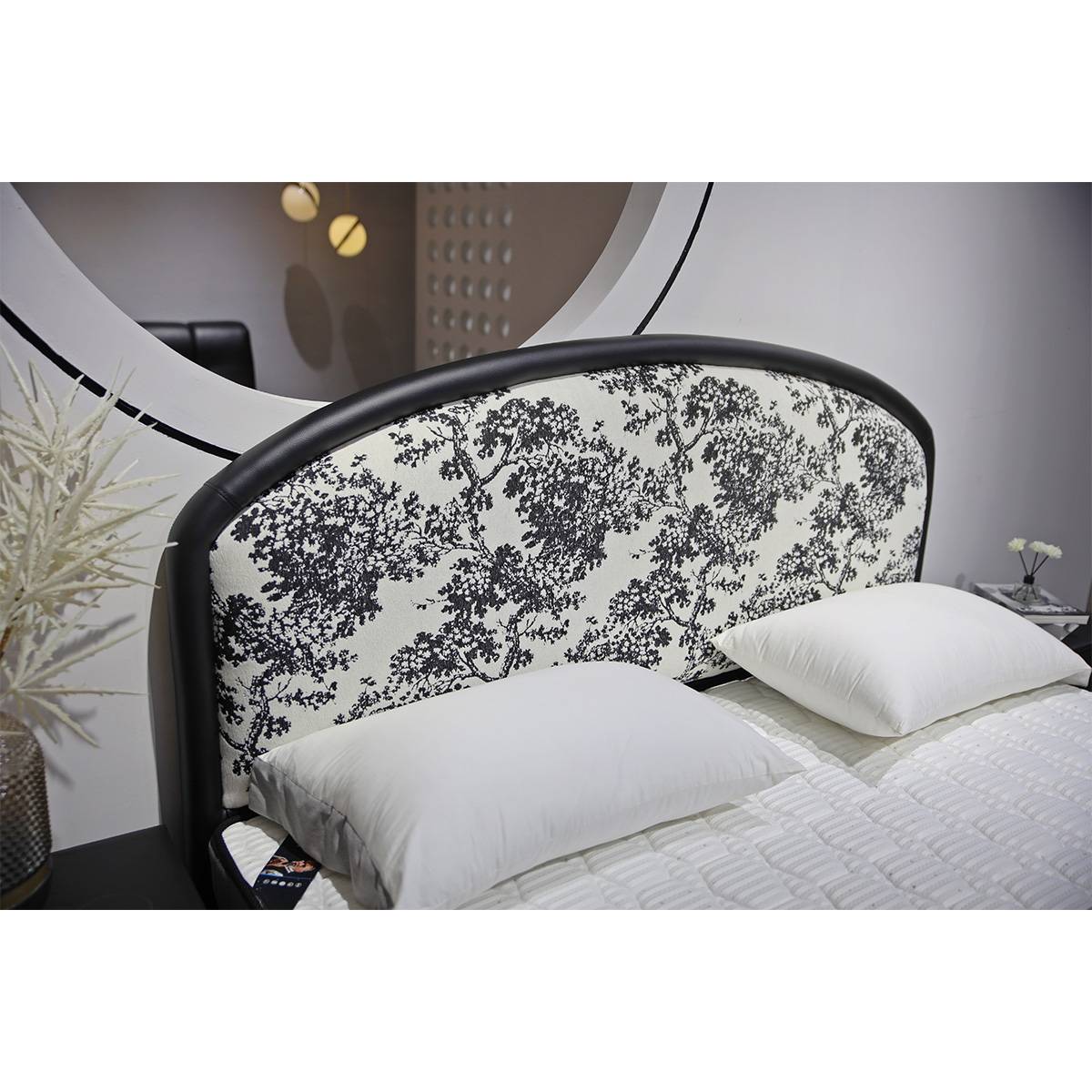 Detail shot of the floral fabric pattern on the headboard