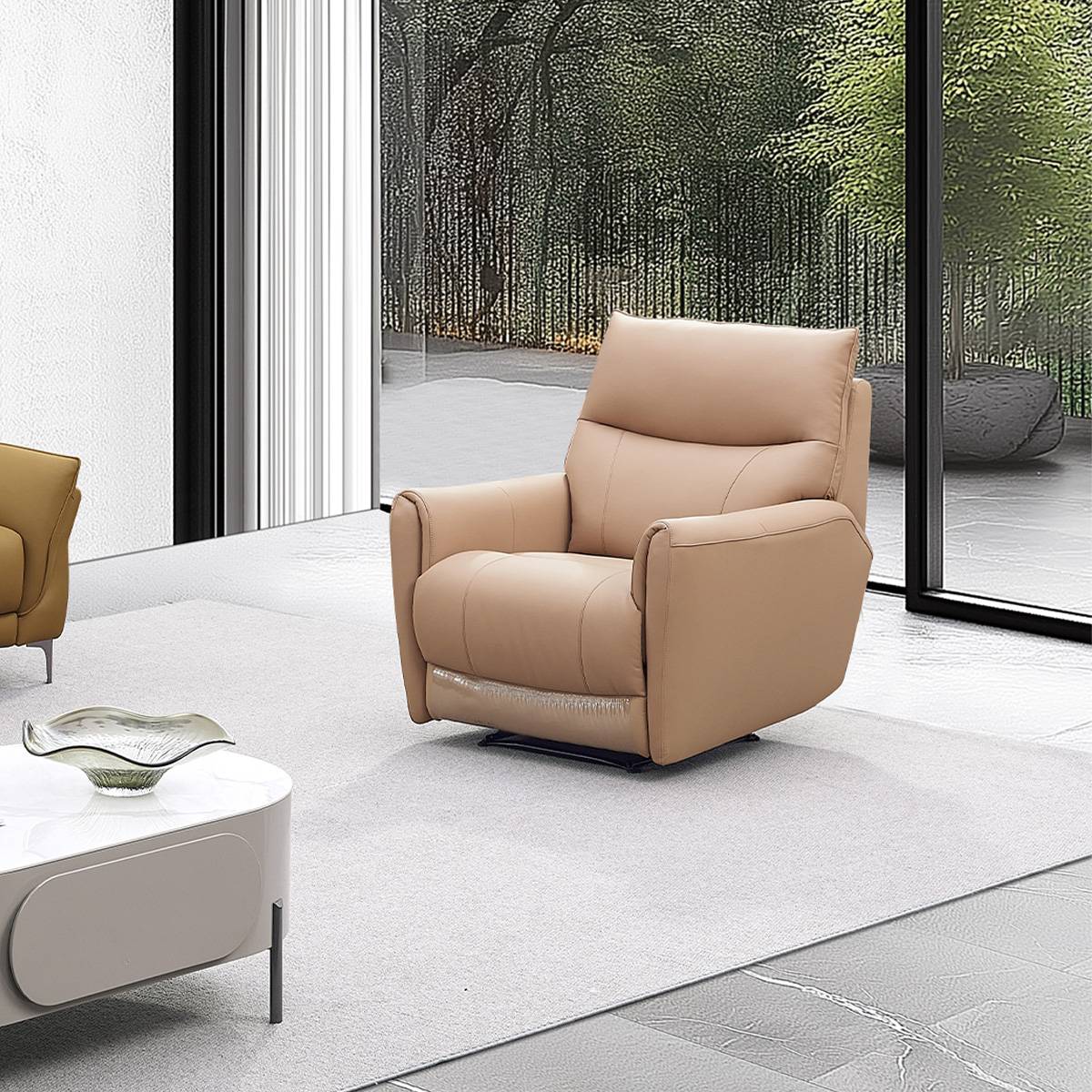 Side view of the matching tan leather recliner armchair