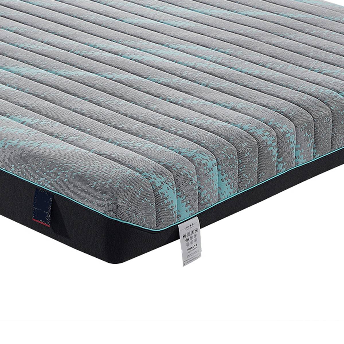 Close-up detail of the mattress fabric texture and side label