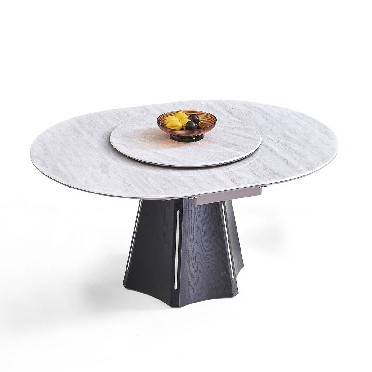 Studio shot of the dining table showing the marble pattern top and fruit bowl
