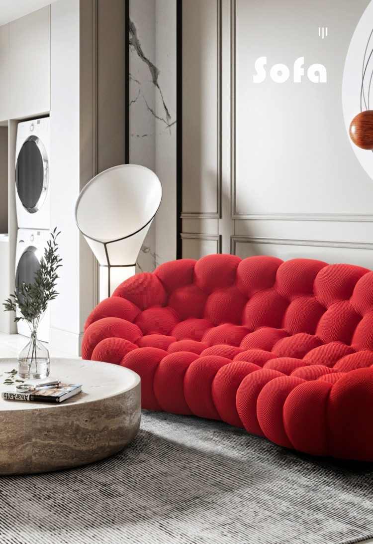 Wide angle view of the red bubble sofa in a living room