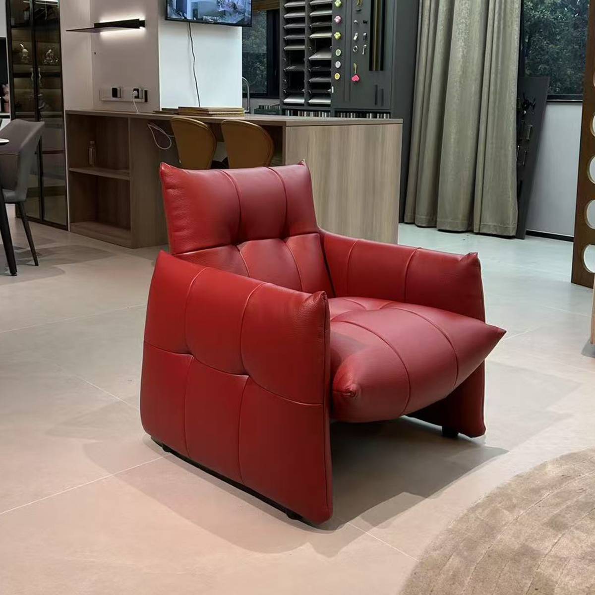 Rear view of red lounge chair in showroom setting