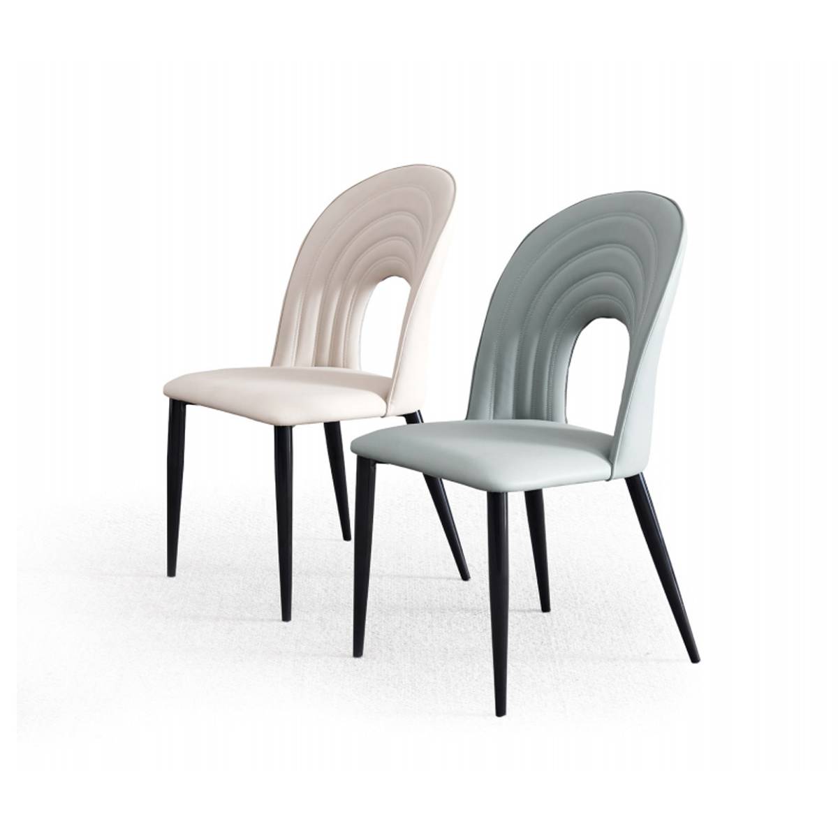 Side view of beige and green dining chairs showing curved back design