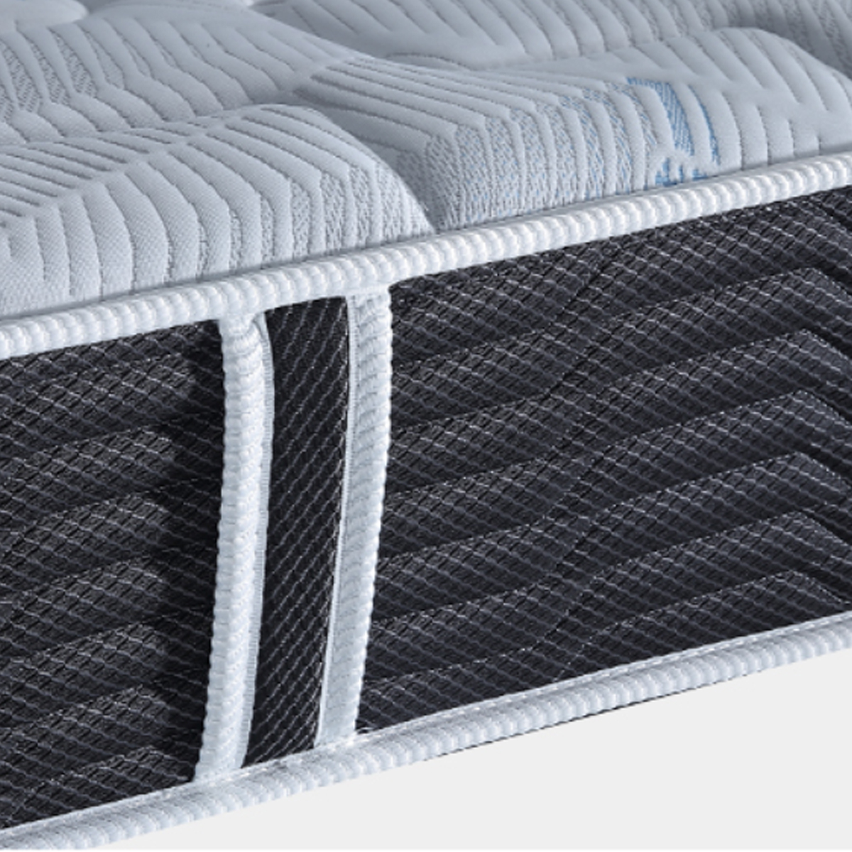 Close-up detail of the mattress side piping and fabric texture