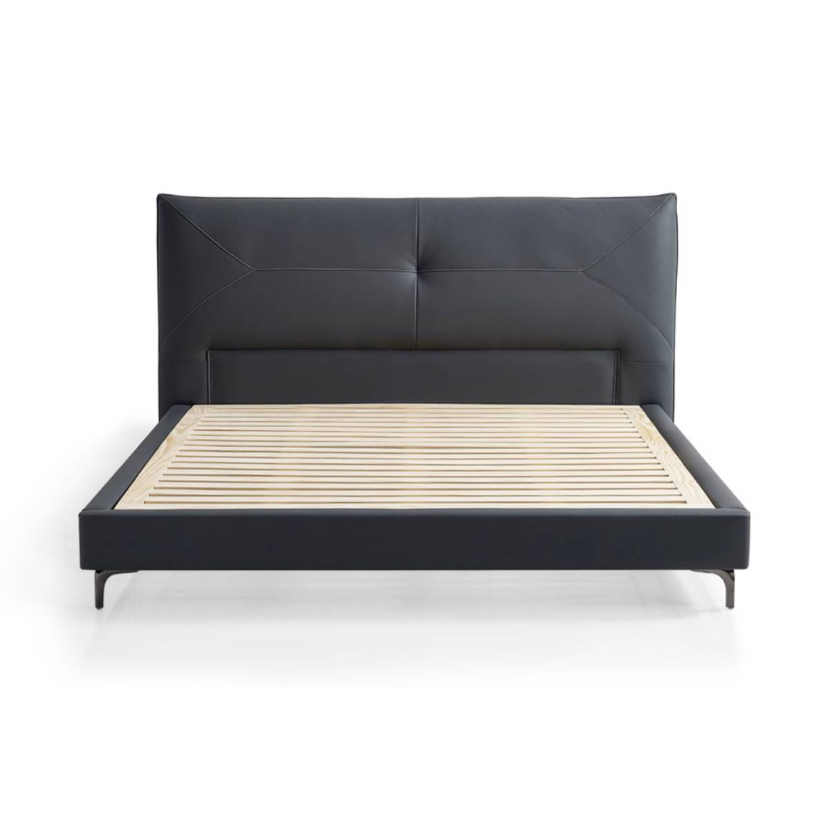 Front view of the black leather storage bed showing the headboard and frame