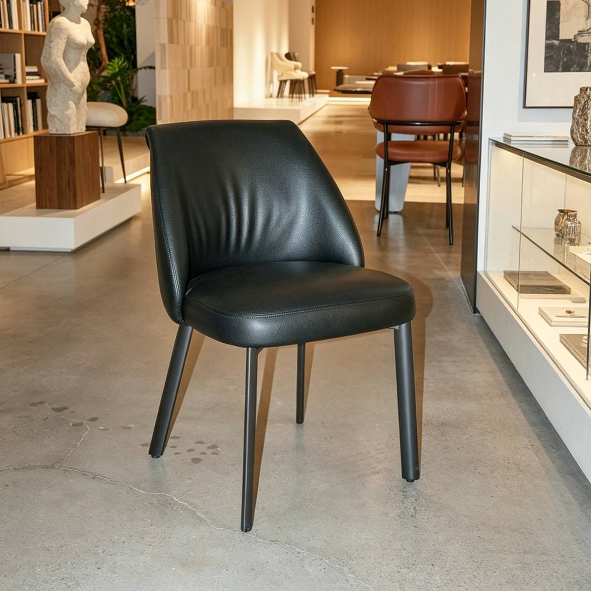Black modern dining chair with black metal legs