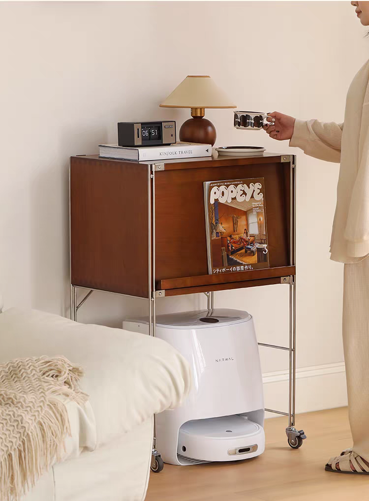 Bauhaus sideboard with wooden cabinet and metal frame next to a bed