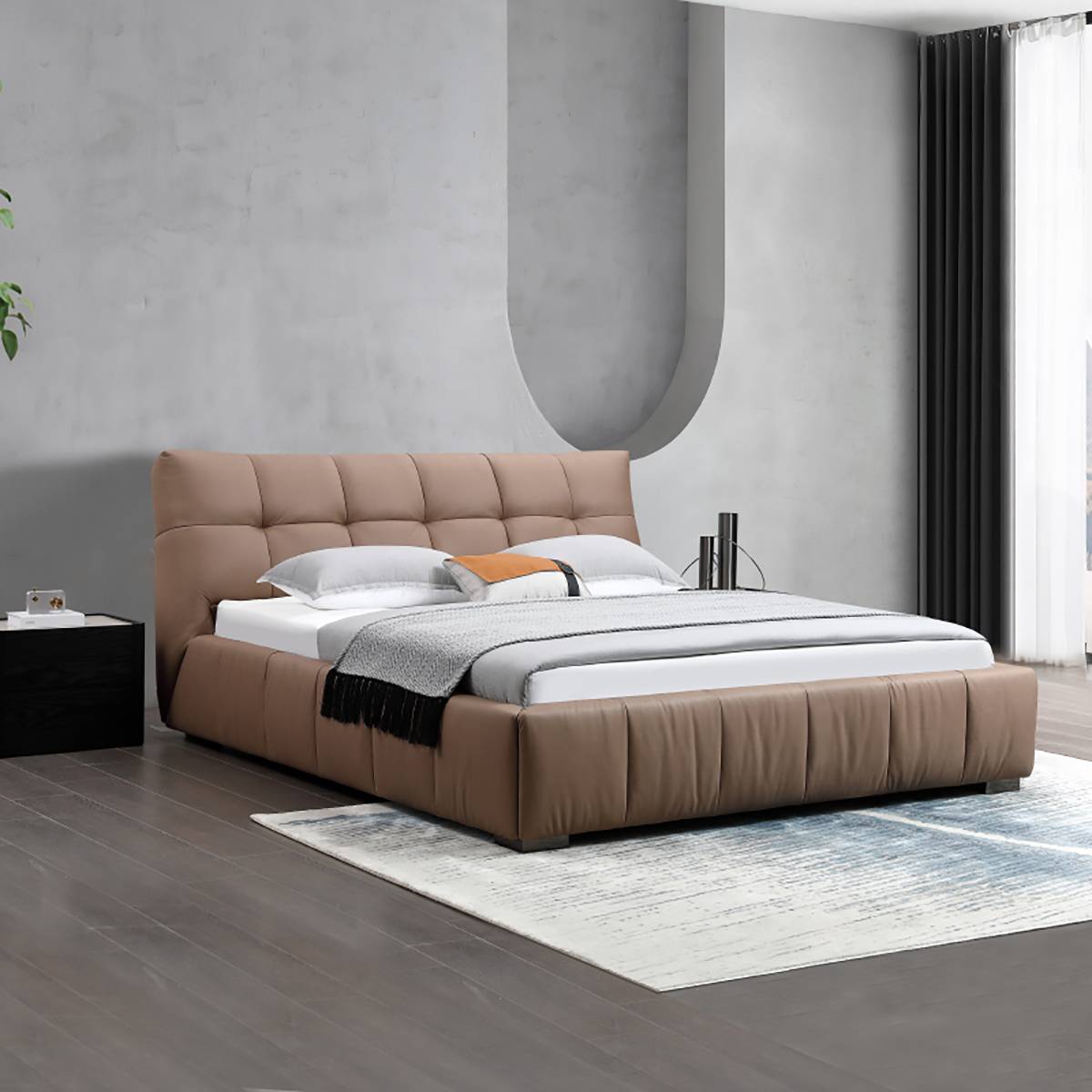 Bed in modern bedroom setting with grey walls