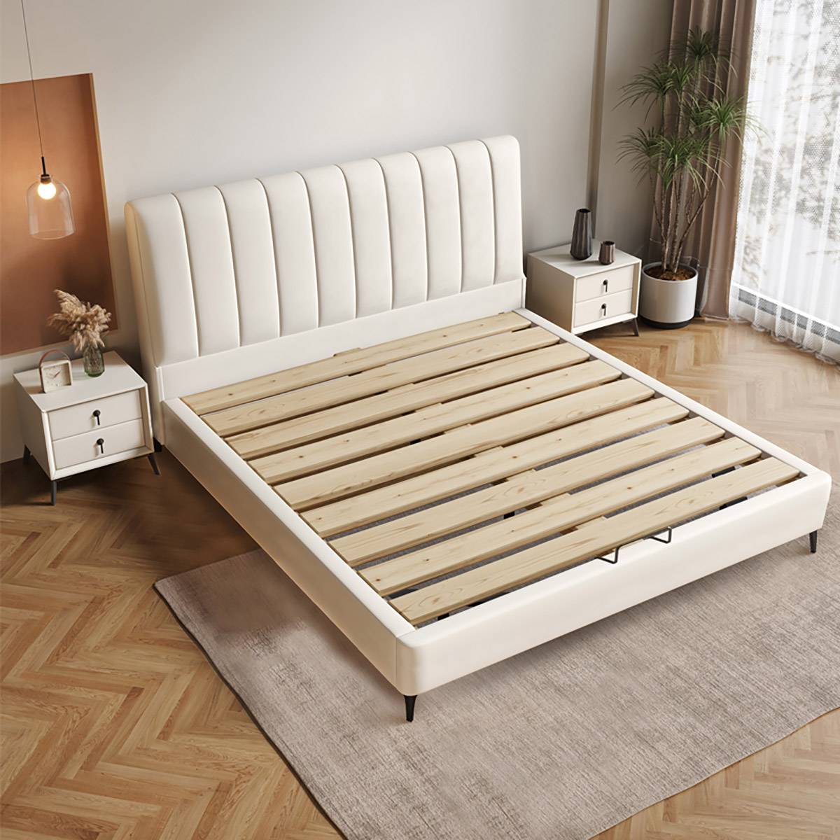 Bed frame showing pine wood slat base without mattress