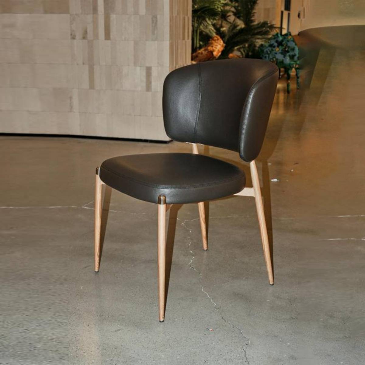 Coffee colored modern dining chair with ash wood legs