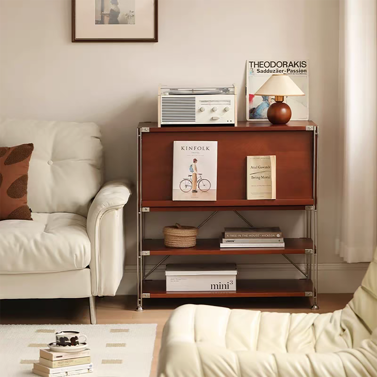 Sideboard placed next to a white sofa with a record player on top