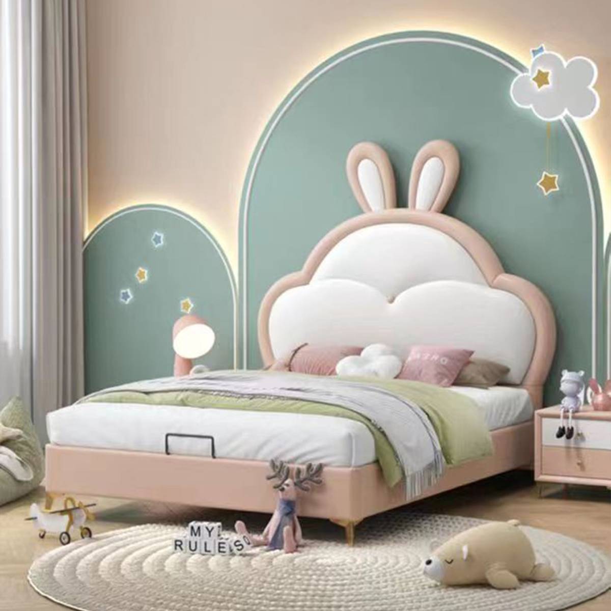 Side angle view of the children's bed showing the wall design and bedside table