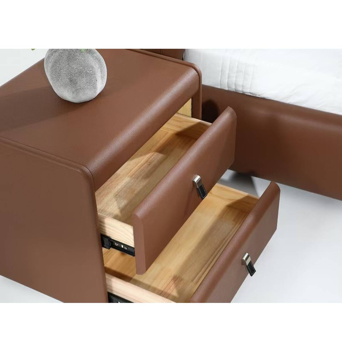 Matching leather bedside table with wooden drawers
