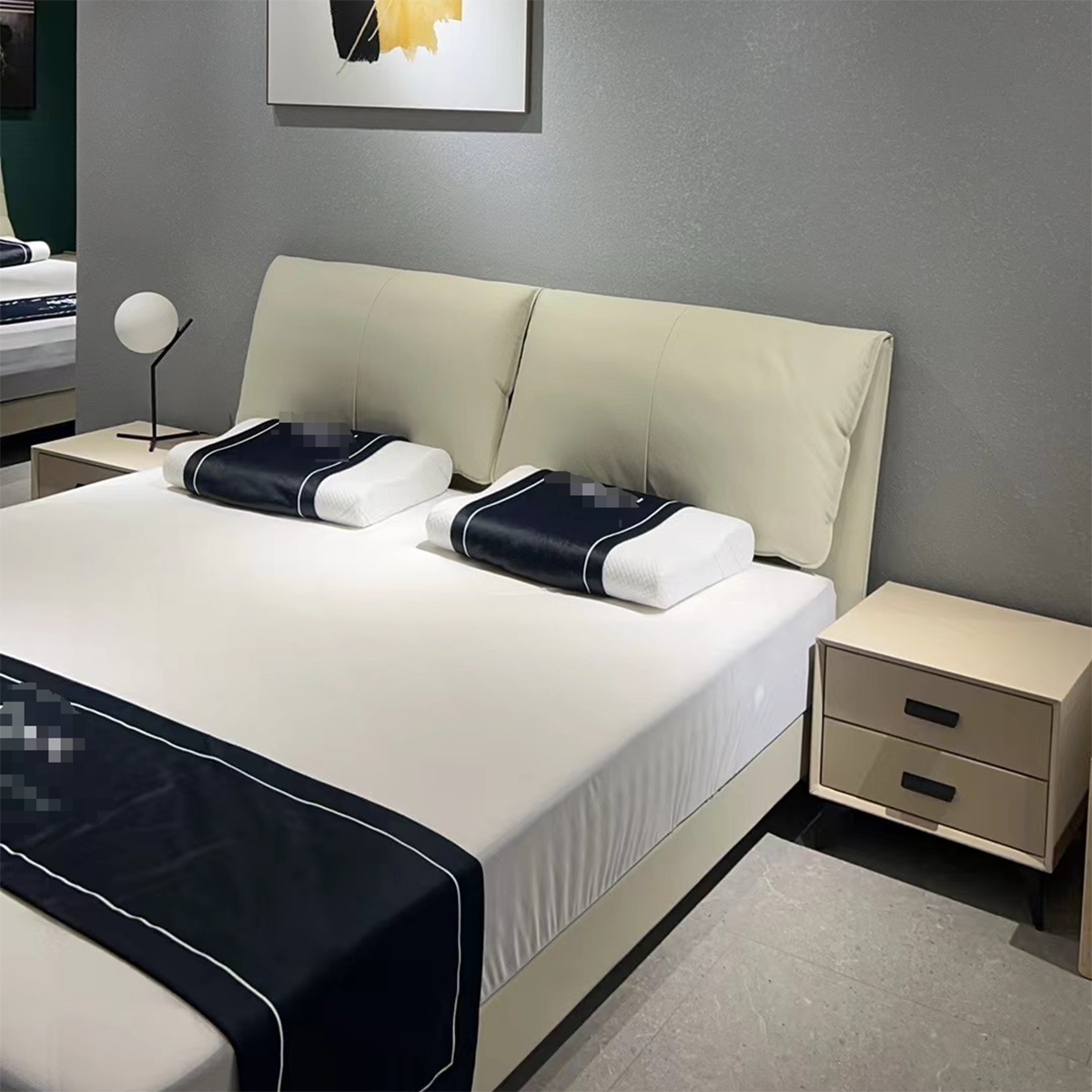 Full view of the A19 Elephant Ear bed in a bedroom setting with bedding and nightstands