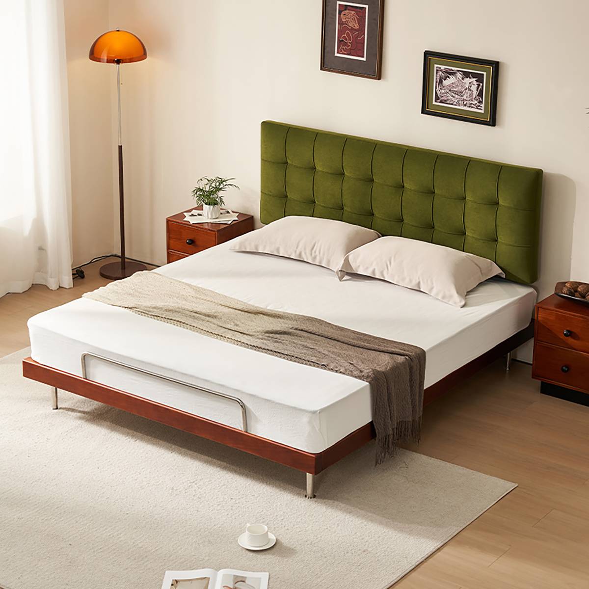 Side angle view of the bed showing the metal legs and frame