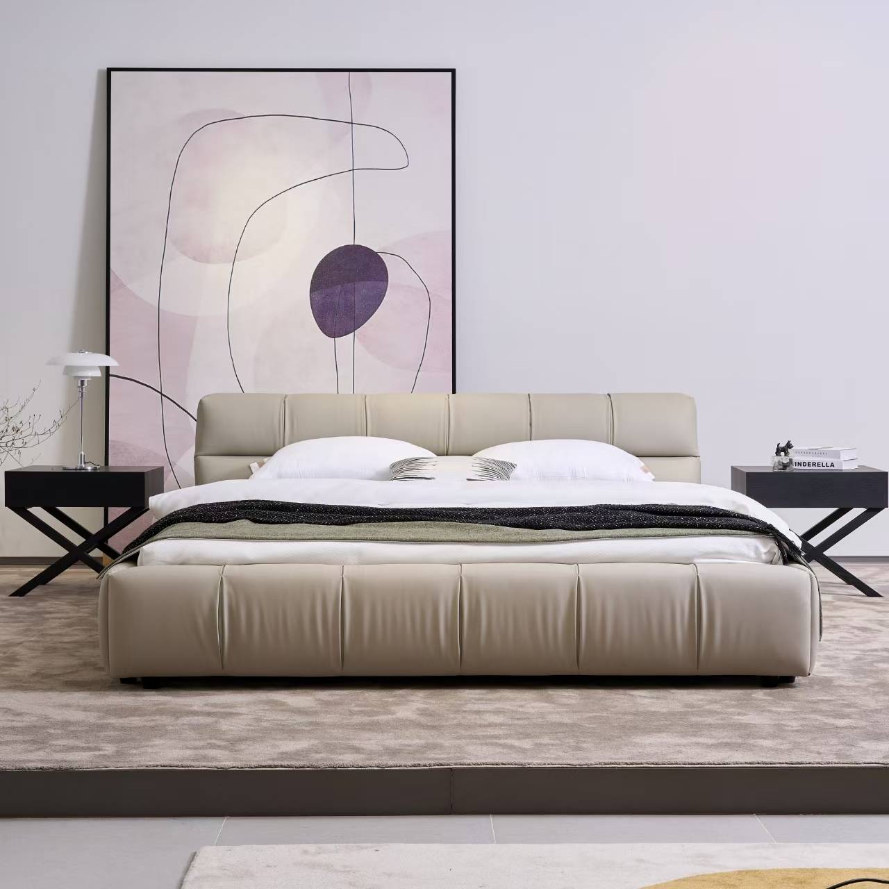 Front view of the bed highlighting the tufted footboard and headboard design.