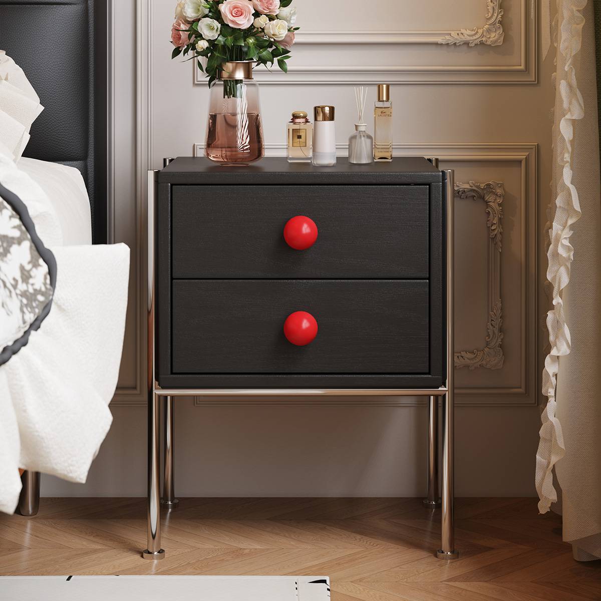 Black Bauhaus bedside table with red spherical knobs and stainless steel legs
