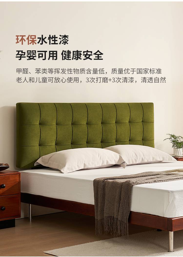 Full view of the bed with green headboard and white bedding, highlighting the eco-friendly water-based paint finish