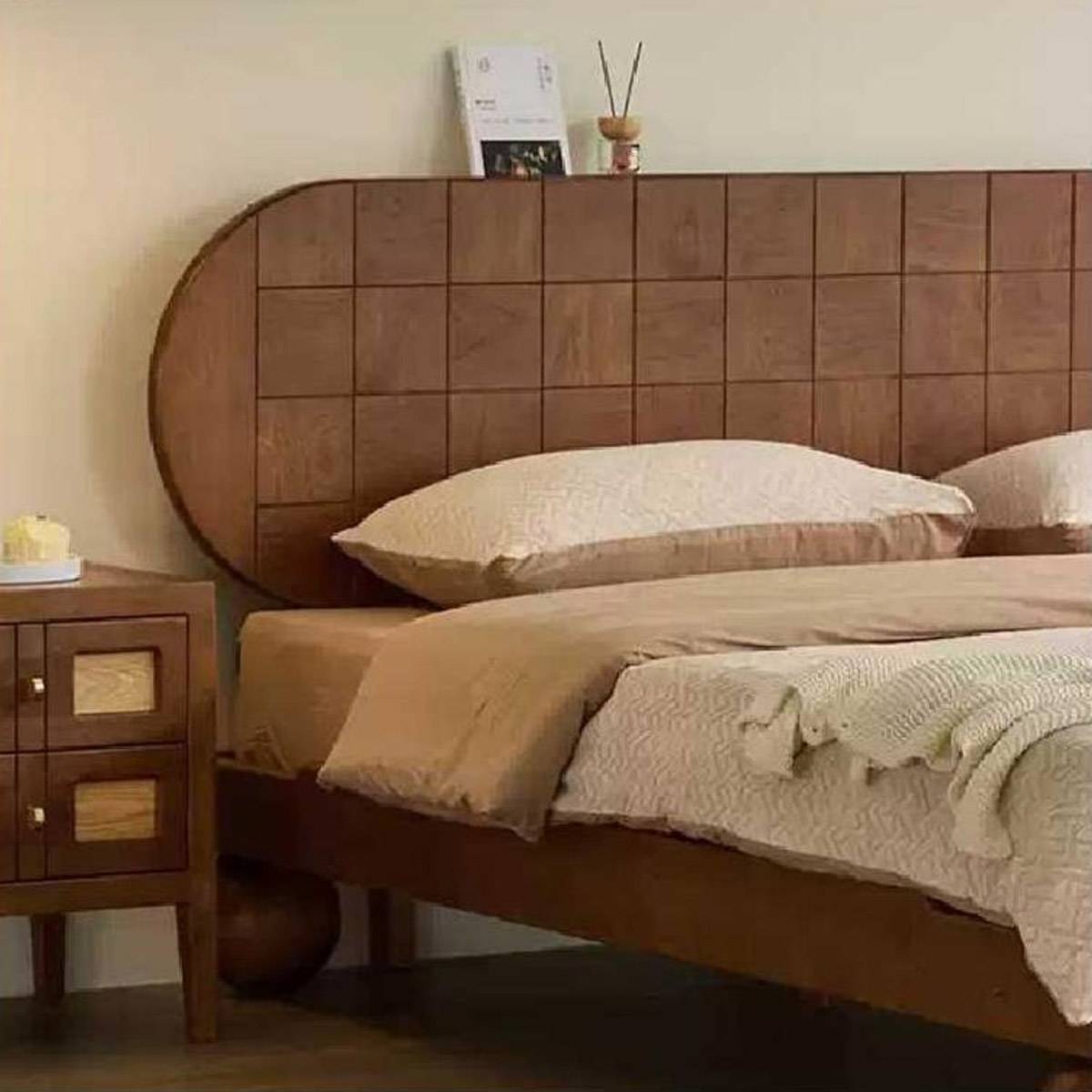 Close-up detail of the bed headboard and bedding texture