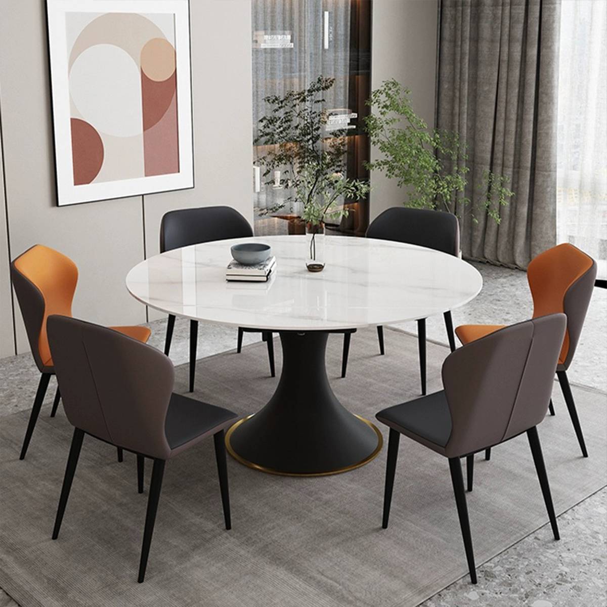 Dining table set with grey and orange chairs in a living room setting