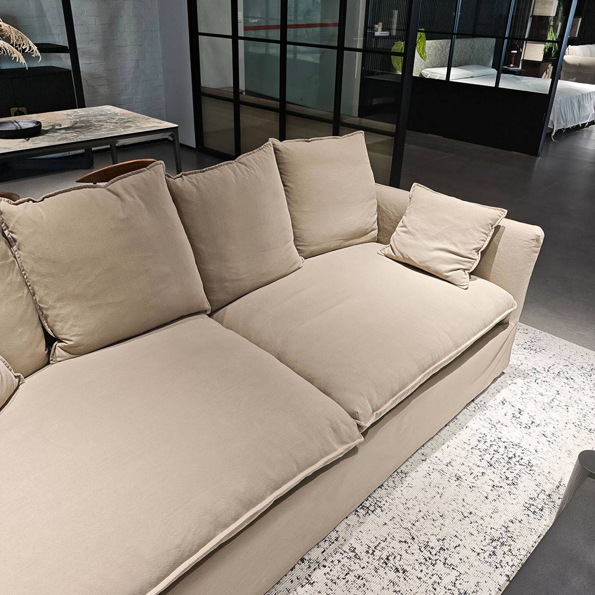 Close-up view of the sofa cushions and fabric texture