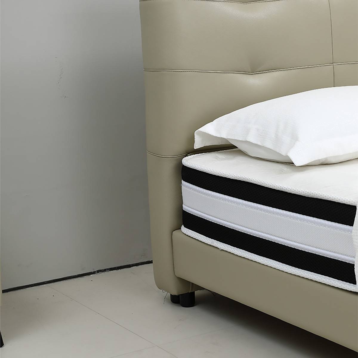 Close-up of the headboard corner and mattress edge