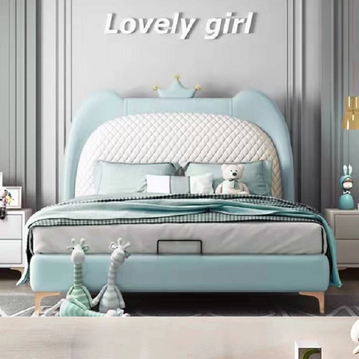 Light blue upholstered children's bed with crown headboard