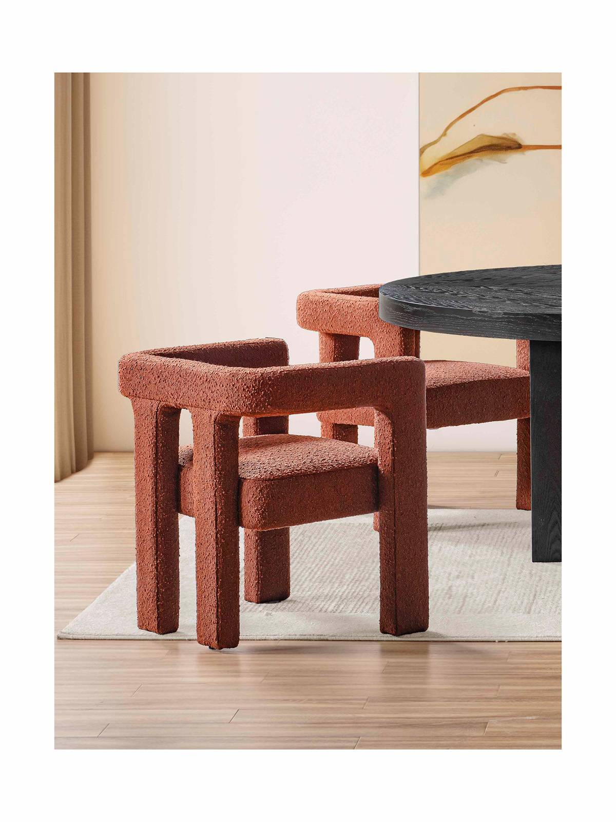Terracotta boucle accent chair in a dining setting