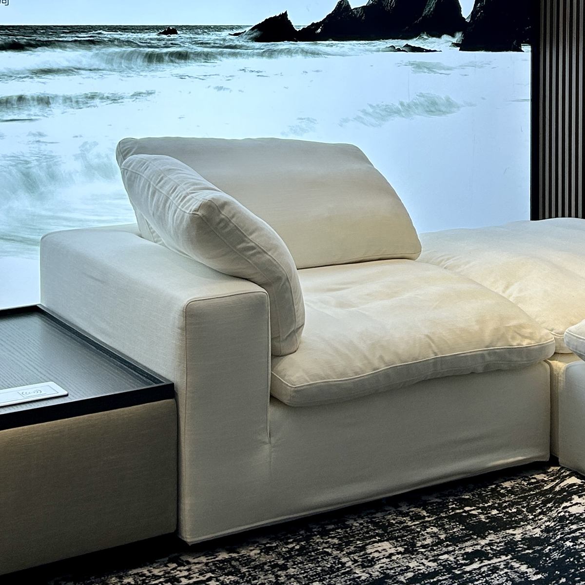 Close-up detail of the sofa armrest and back cushion