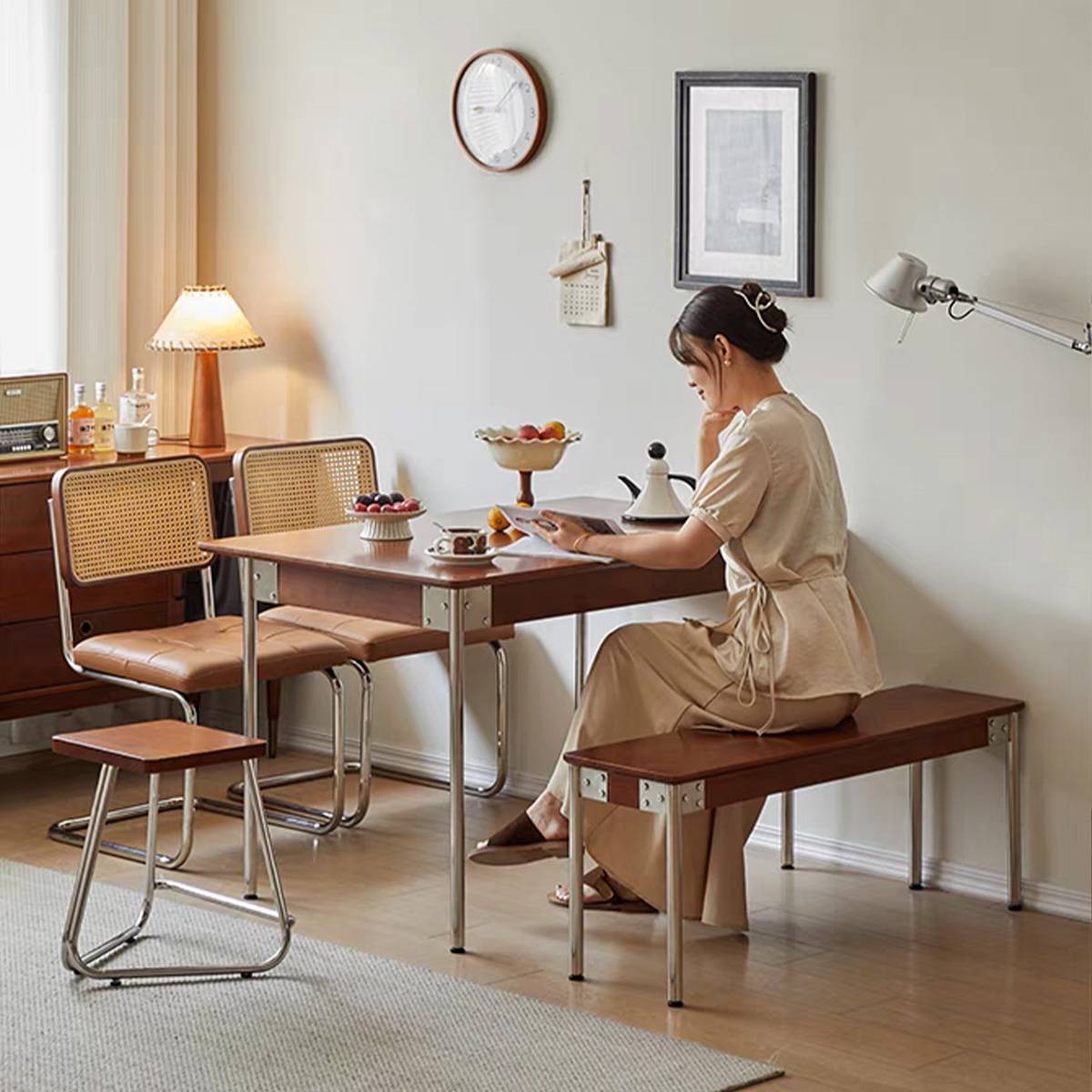 Rear view of the dining table setup with chairs and bench