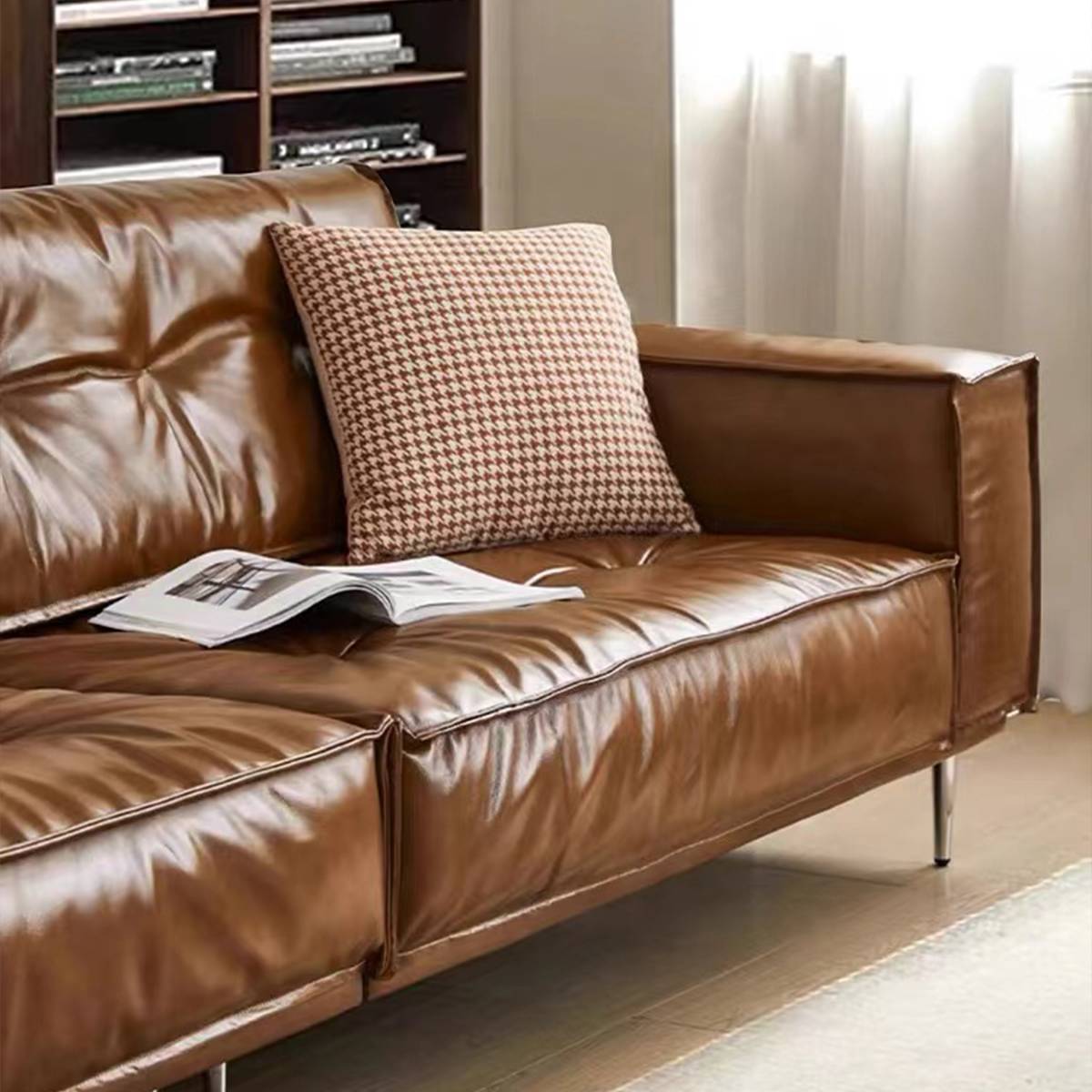 Side view of the sofa with a patterned throw pillow