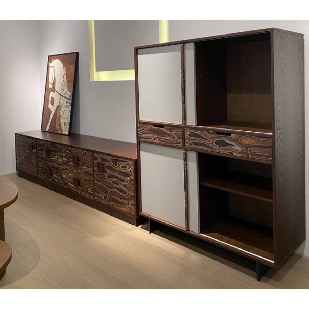 Modern wooden sideboard set displayed in a room setting with artwork on the wall.